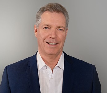 Photo of an appointment of Bruce Miles as President of HumanWare