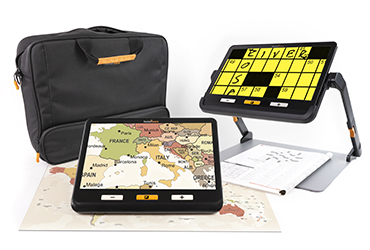 Image of the explore 12 with a folding stand that magnifies a map of Europe, used with the portable reading stand to enlarge a crossword puzzle and the carrying bag provided with the device.