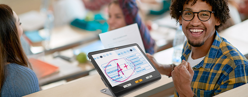 Image of a smiling teenager magnifying his A+ test result using Explorer 12.